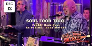 Soul food trio performing with text overlay on a stage.