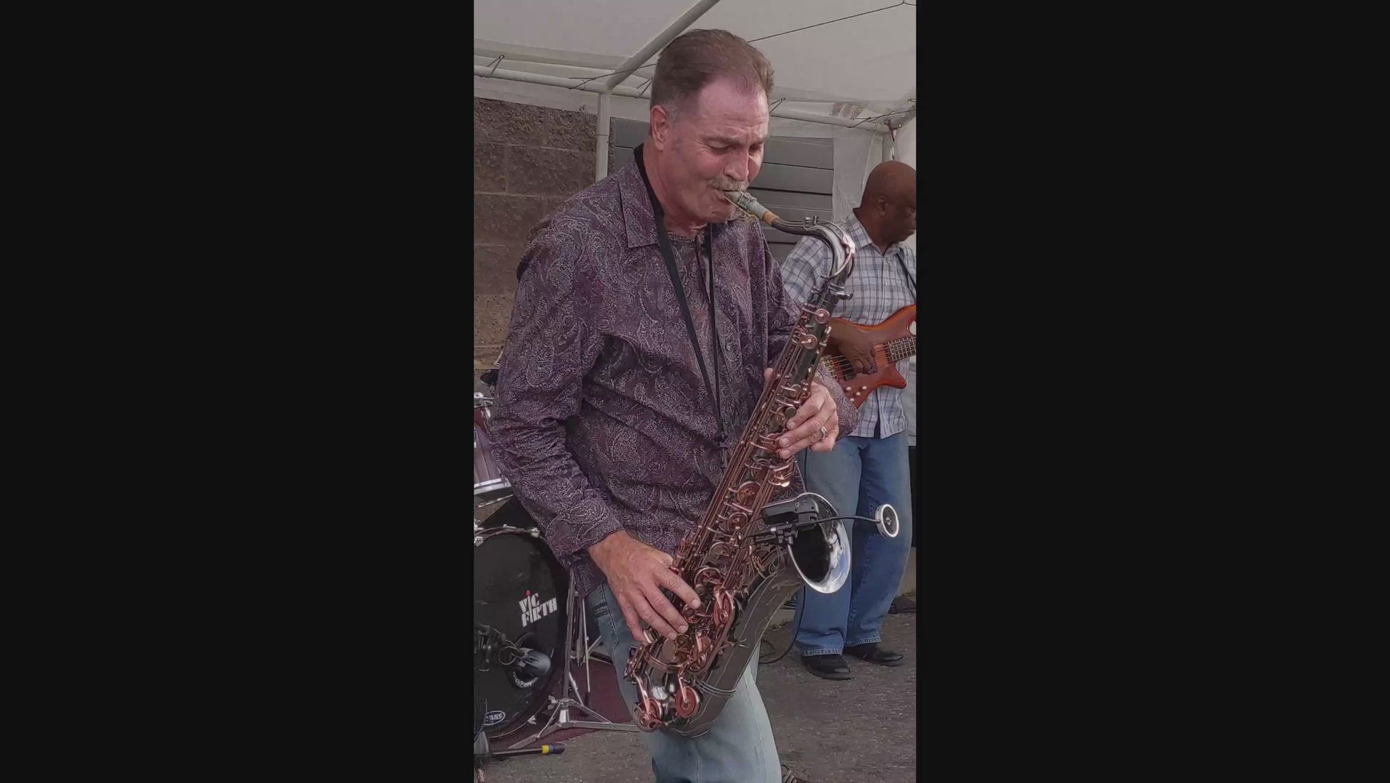 Steve Watts of Dotsero plays a sax solo at Bonacquisti Wine