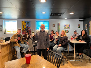 Happy wine class participants with Paul Bonacquisti
