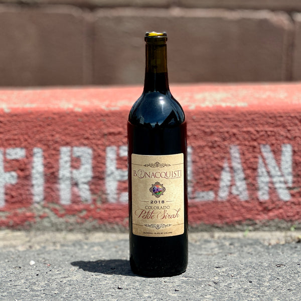 A bottle of 2018 Colorado Petite Sirah from Bonacquisti Wine Company